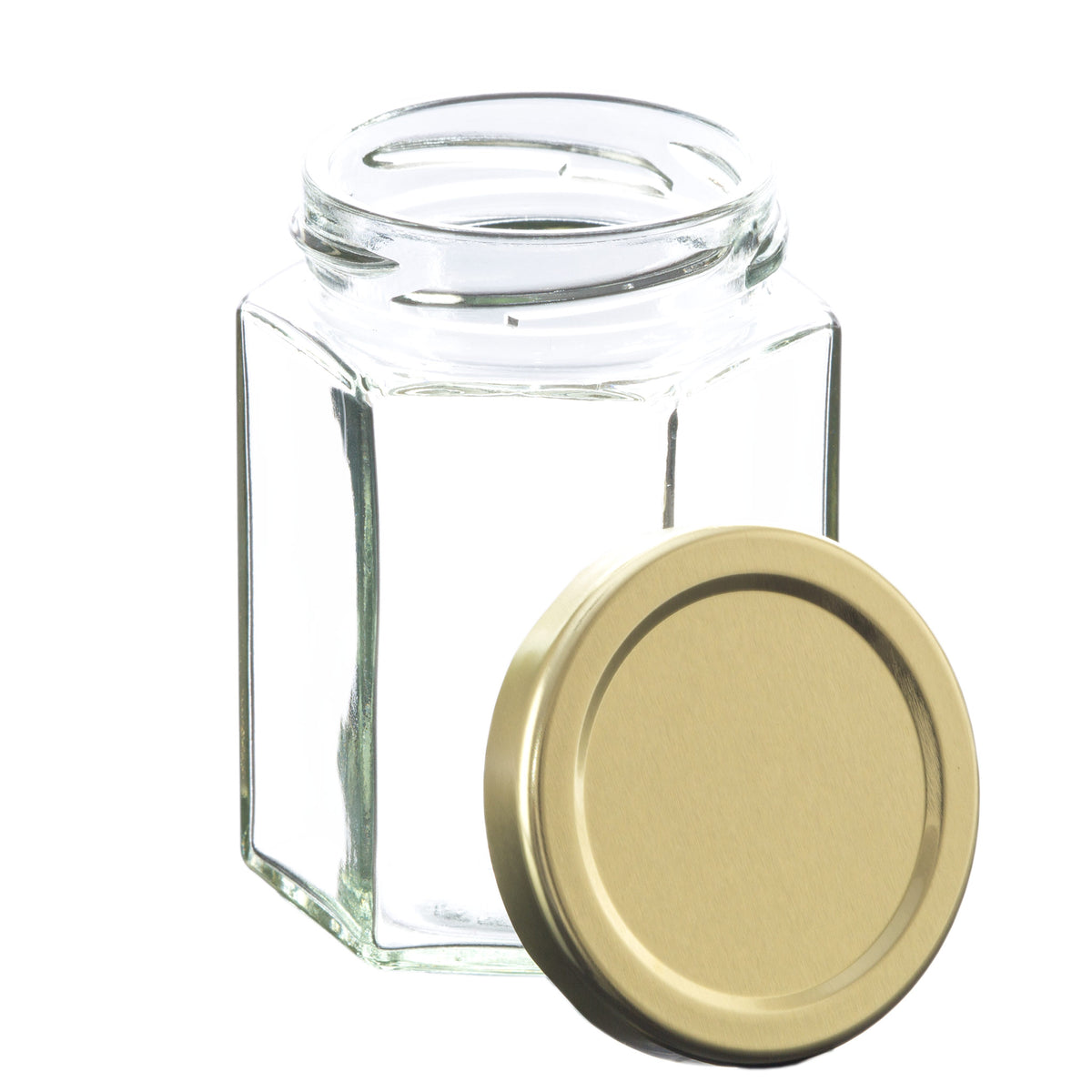 https://www.voyageursoapandcandle.shop/wp-content/uploads/1691/94/take-a-look-at-our-190-ml-hexagon-glass-jar-with-58mm-gold-metal-lug-lid-voyageur-glass-jars-collection-get-them-now_2.jpg